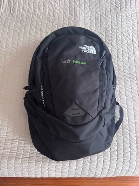The North Face Black Backpack with Green Meraki Accent